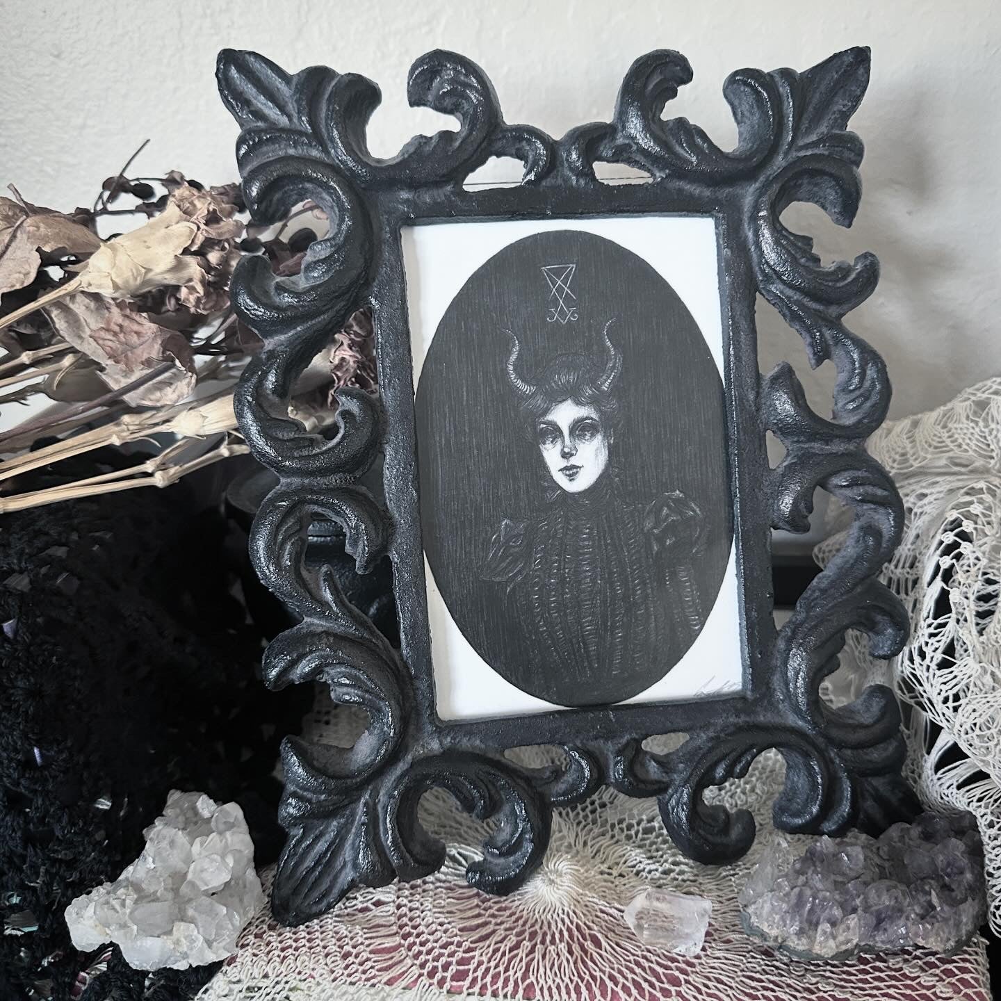 Lady Lucifer in Vintage Cast Iron Frame